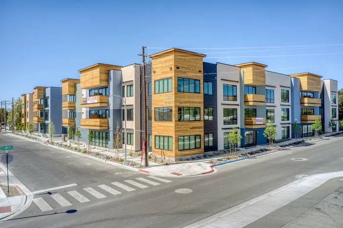 street corner and corner of 3 story apartment building at oner midtown