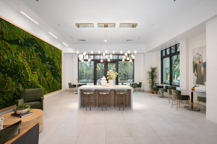 Lobby and resident lounge with seating and tables