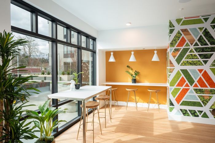Clubroom with bar tables for residents