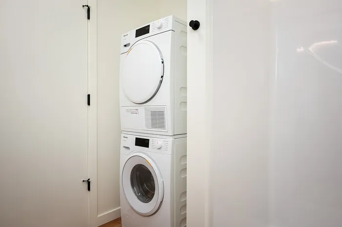 Full sized in unit washer and dryer