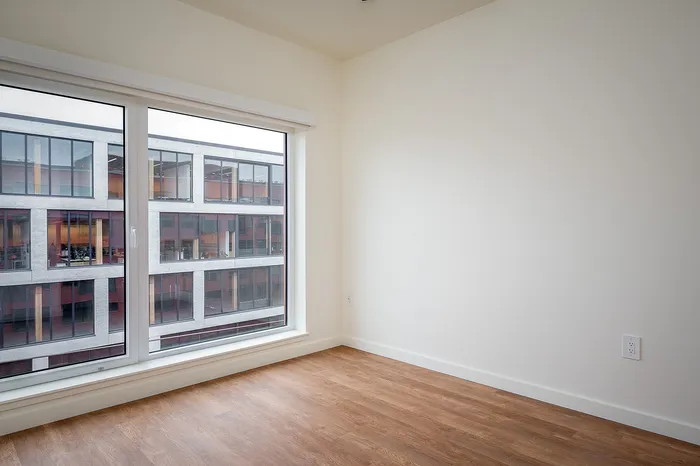 Bedroom with large windows