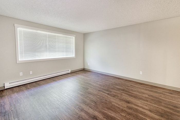 living room with faux hardwood flooring
