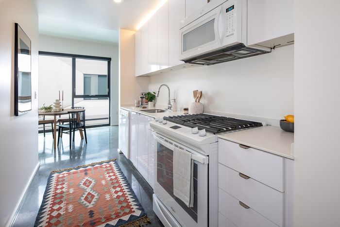 kitchen and dining area at slate apartment
