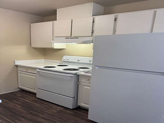 Kitchen with white appliances