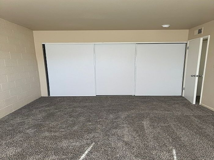 Bedroom with large closets