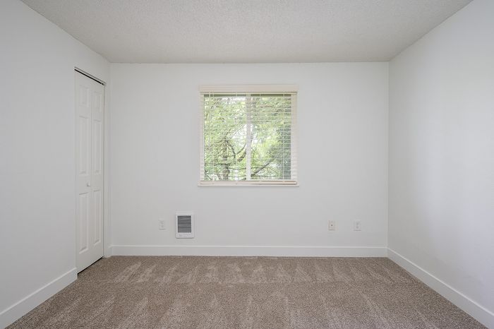 Bedroom with carpeted floors