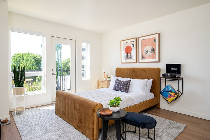 Furnished studio apartment home with in-home washer and dryer at Paceline in North Portland, Oregon