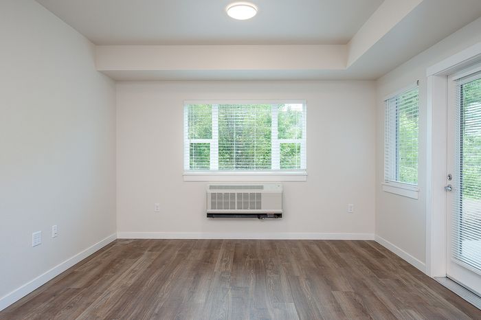 living room with vinyl plank flooring