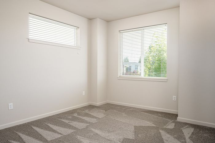 Carpeted bedroom at Alderbrook