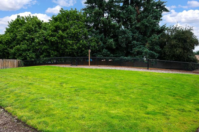 Fenced grassy area at Fairview Court Townhomes in Vancouver WA