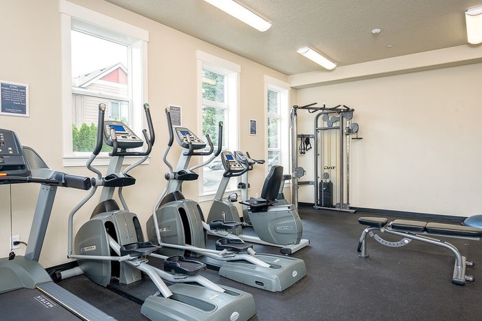 Fitness Center with multiple machines and free weights at Fairview Court in Vancouver, WA