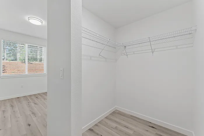 large walk-in closet at Spring Meadow Apartments in Newberg, OR