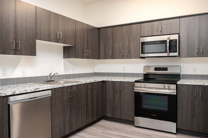 U-shaped kitchen with stainless steel appliances
