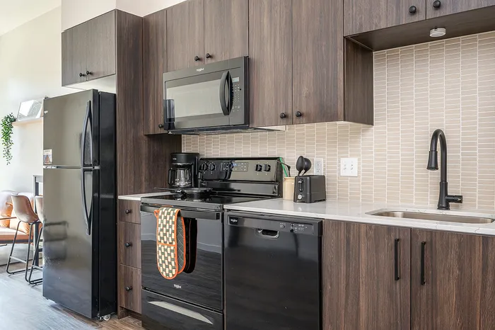 Fully Furnished One-Bedroom, One-Bathroom Floor Plan kitchen and living area