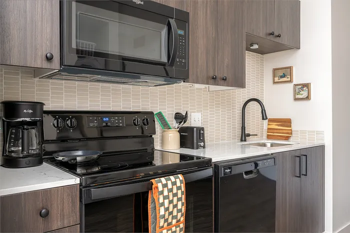 Fully Furnished One-Bedroom, One-Bathroom Floor Plan kitchen