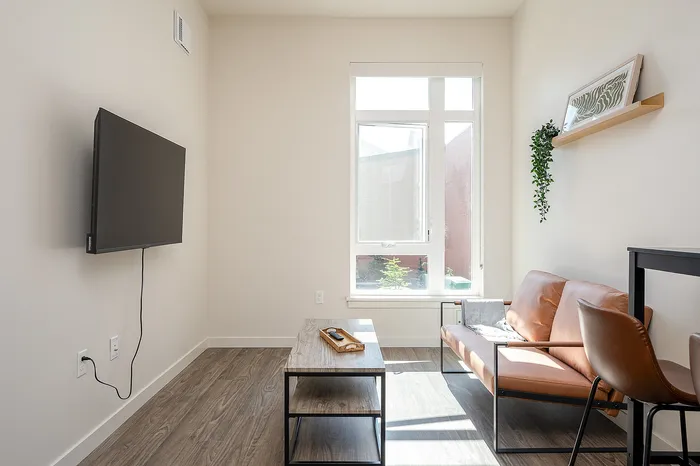 Fully Furnished One-Bedroom, One-Bathroom Floor Plan living area