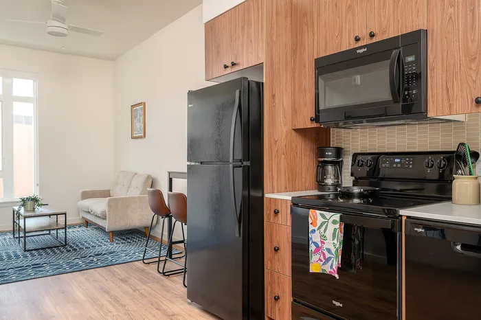 Fully Furnished One-Bedroom, One-Bathroom Floor Plan kitchen and living area