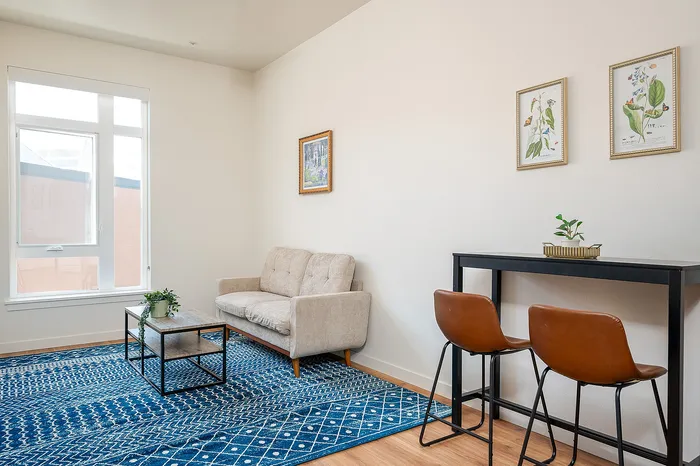 Fully Furnished One-Bedroom, One-Bathroom Floor Plan living area