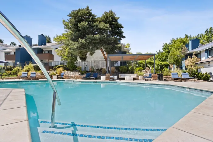sparkling pool and lounge area