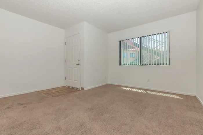 entrance to 1x1 with carpeted living room