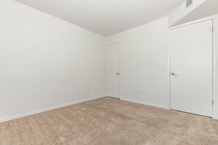 entrance to carpeted bedroom