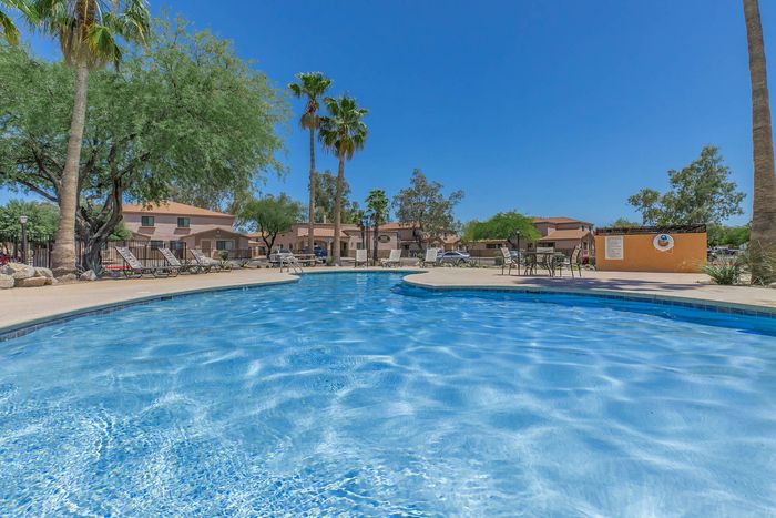 pool with lounge chairs