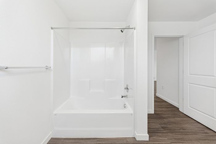 bathroom with shower and tub combo