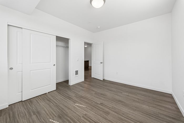bedroom with large attached closet