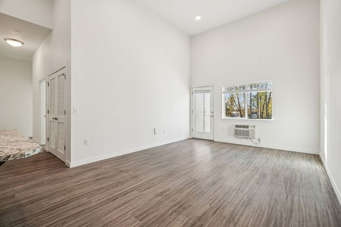 living room with attached kitchen