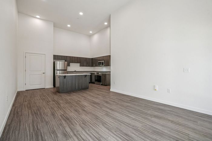 living room with attached kitchen