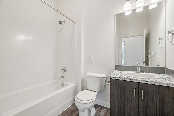 bathroom with shower tub combo