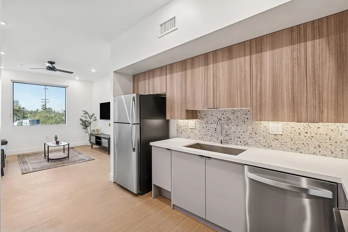 Two bedroom kitchen with stainless steel appliances