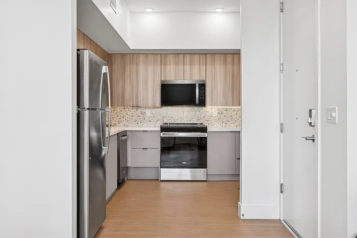Two bedroom kitchen with stainless steel appliances