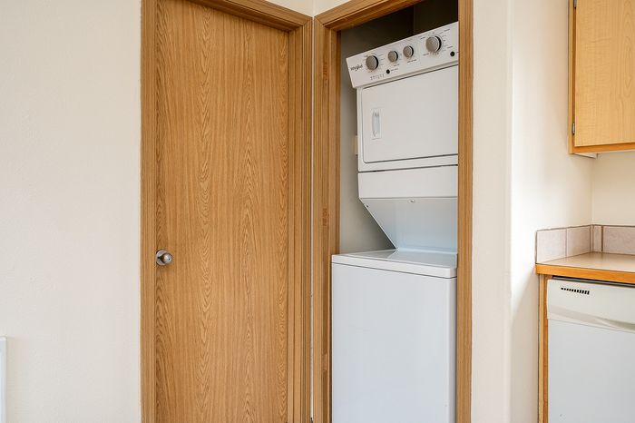 In-Unit laundry stackable washer and drier.