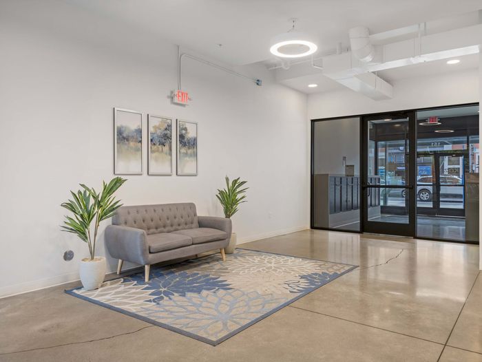 Bright resident lobby with modern seating at Koz on N. Killingsworth.
