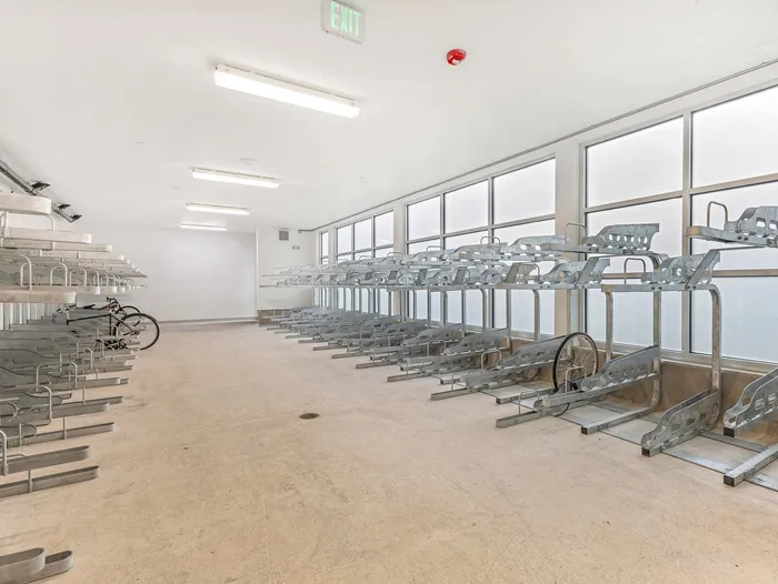 Large on-site bike storage room with racks for residents at Koz on 4th.