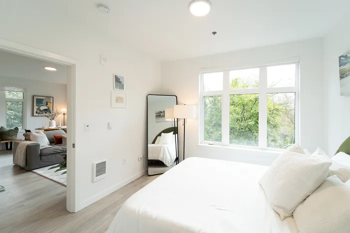 Bedroom with view and living space