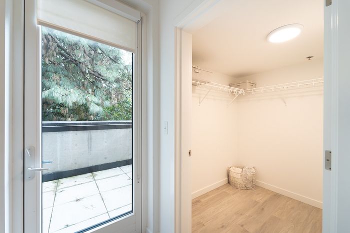Apartment walk-in closet and balcony