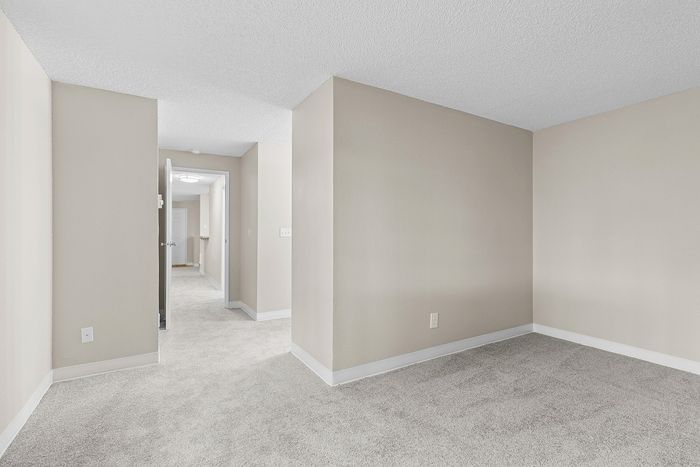 angle 2 of primary bedroom of C1 renovated floorplan at Timber Flats