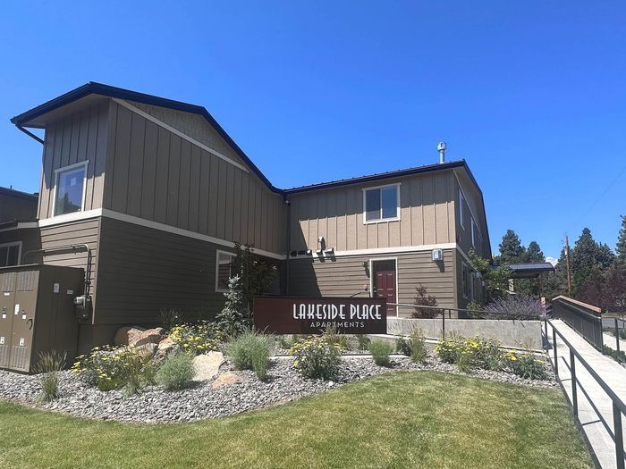 Stylish brown and tan building exterior at Lakeside Place apartments.