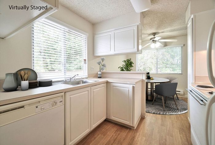 Virtually staged apartment kitchen displaying functional counter space at CAMPBELL PARK.