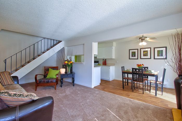 Spacious open floor plan connecting the living and dining rooms at CAMPBELL PARK.