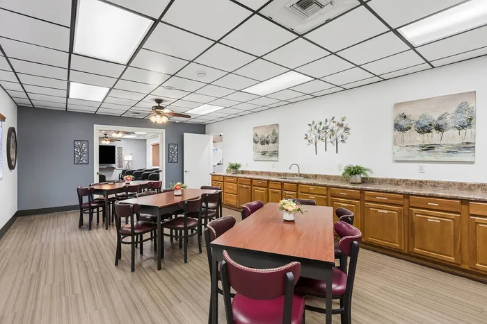 Room at Orchard Mesa with tables and storage