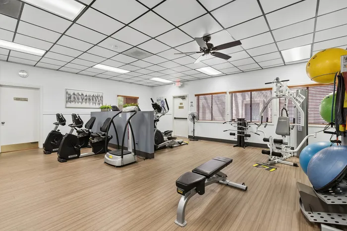 Fitness room at Orchard Mesa with various fitness equipment