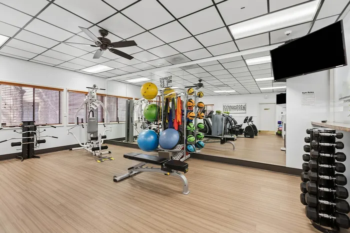 Fitness room at Orchard Mesa with various fitness equipment