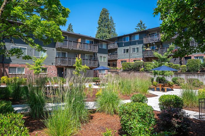 Creston Villa Exterior with landscaping and trees