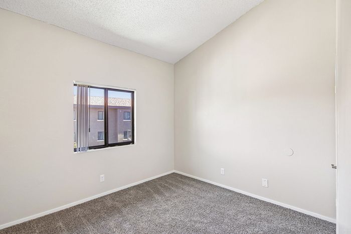 bedroom at ventura villas with small window