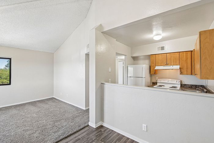 living room in 2x1 floorplan at ventura villas into kitchen