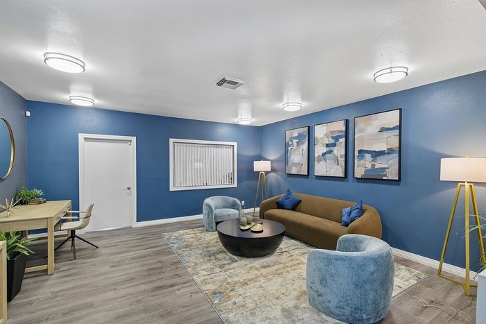 lobby at ventura villas with couch and chairs