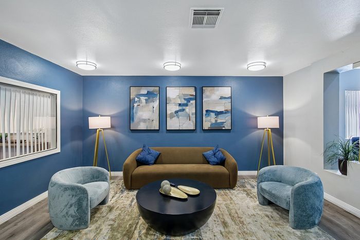 lobby at ventura villas with couch and chairs